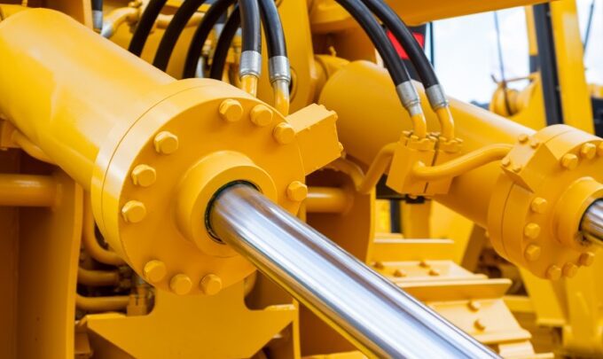 Hydraulic Cylinder on a yellow commercial vehicle
